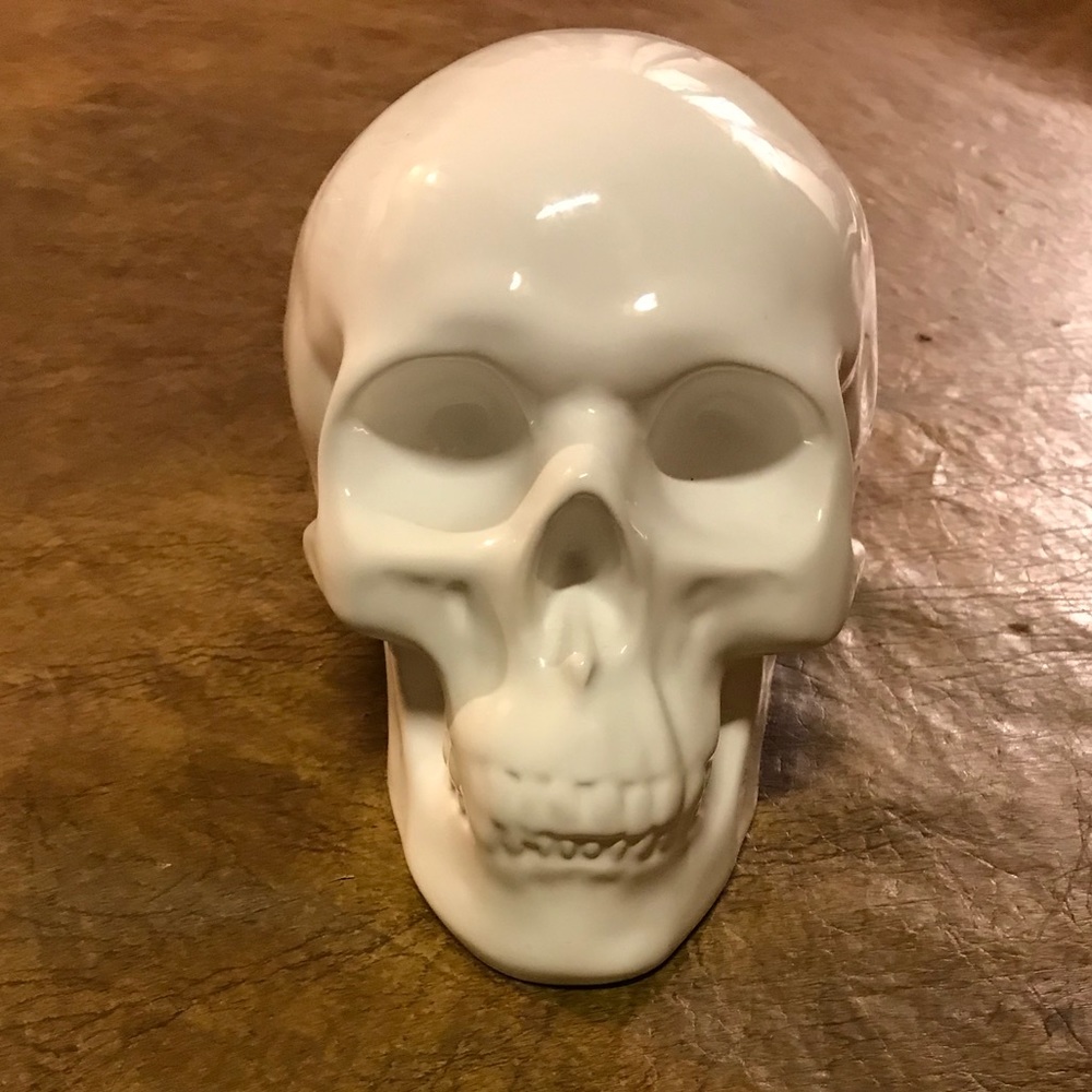 White ceramic skeleton piggy bank